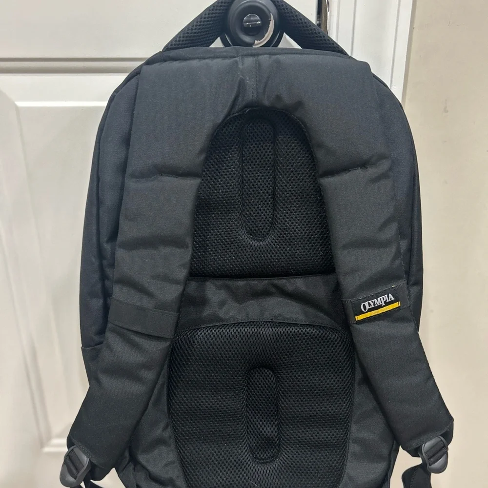 Compact Black Men's Backpack with Subtle Red Accents